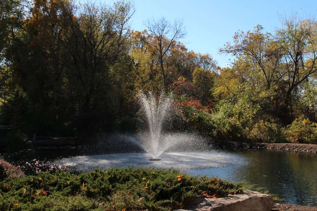 Otterbine All-in-One pond aerator fountain with wide fan spray pattern in lake