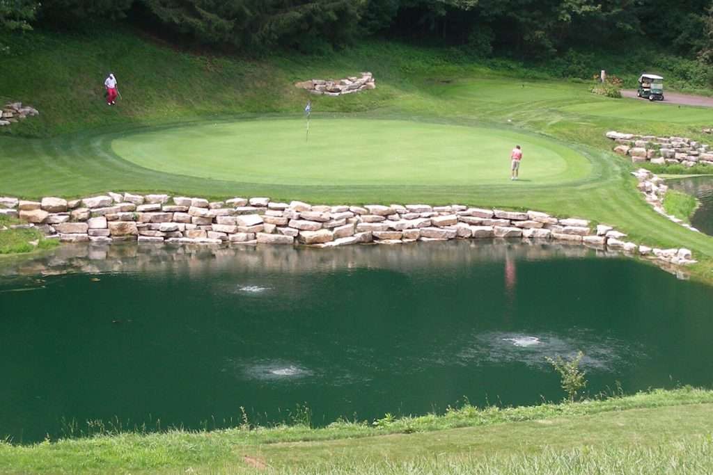 Otterbine Air Flo 3 subsurface pond aerator at golf course water hazard