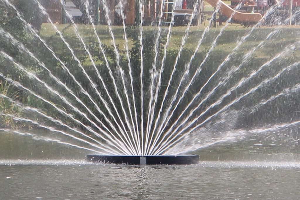 Close-up of Otterbine Aries fountain showing fan-shaped water jets