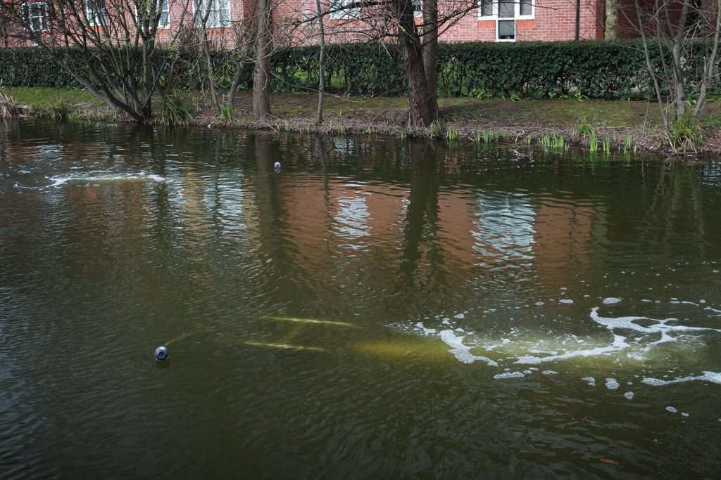 Otterbine Aspirator Aerator operating in a lake with strong circulation