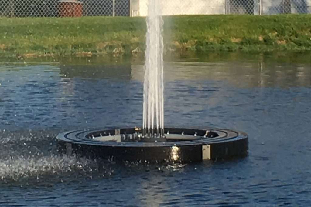 Close-up of the Otterbine Supernova fountain base with vertical water spray