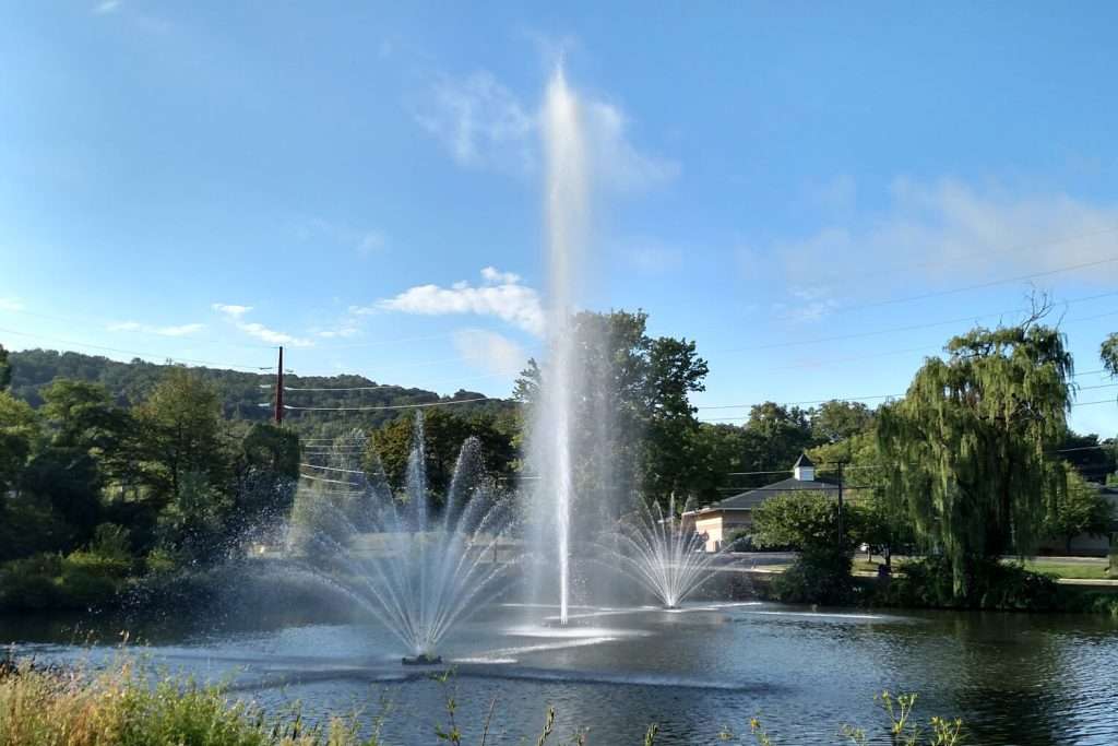 Otterbine Supernovae QXS fountain display with multiple sprays in a pond