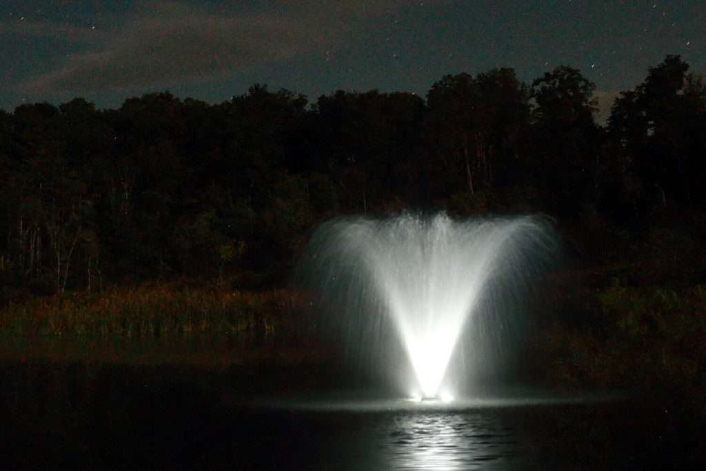 LED low voltage fountain with bright white glow at night